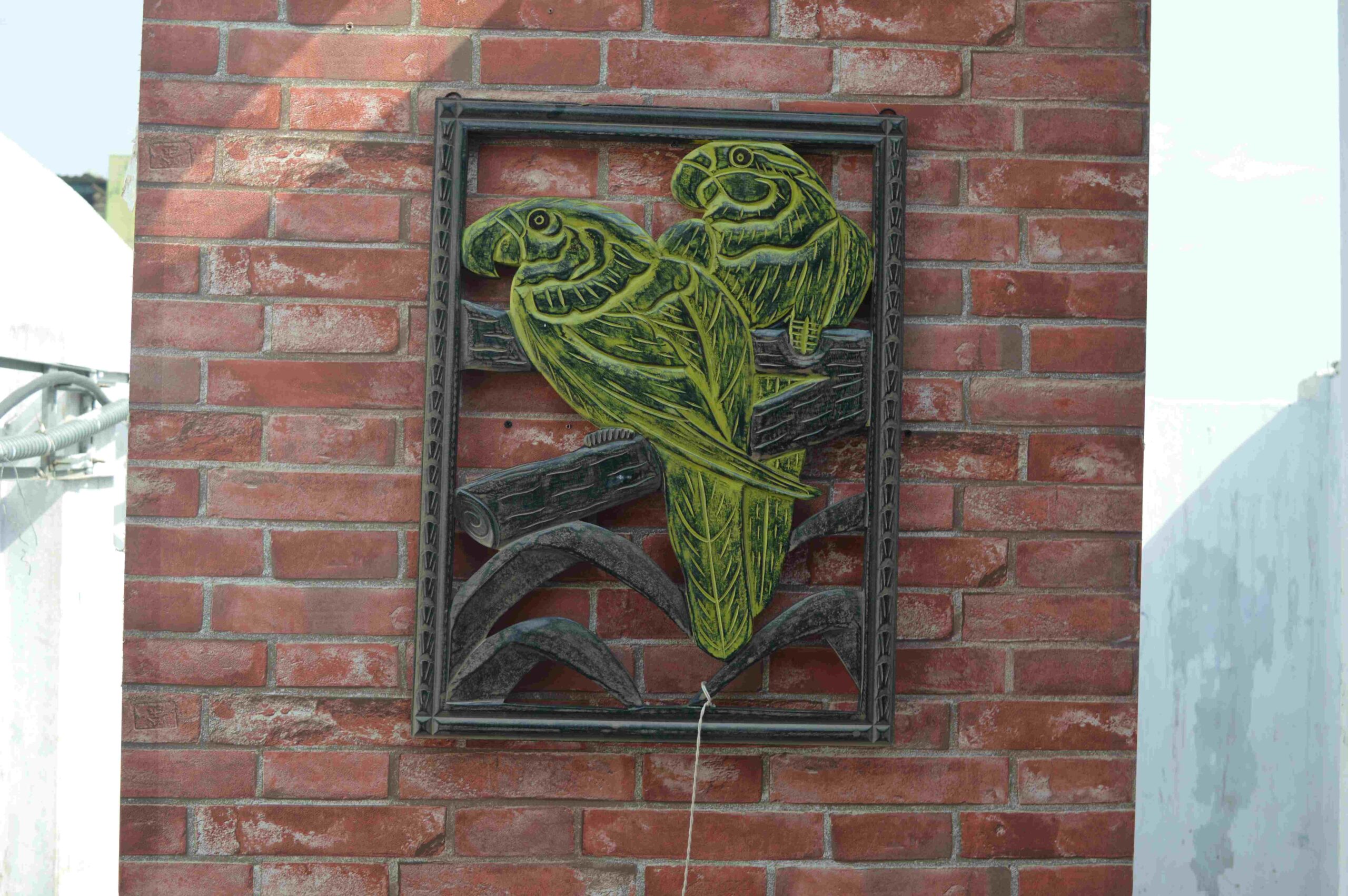 Handcrafted Wooden Wall Hanging with Parrot Design