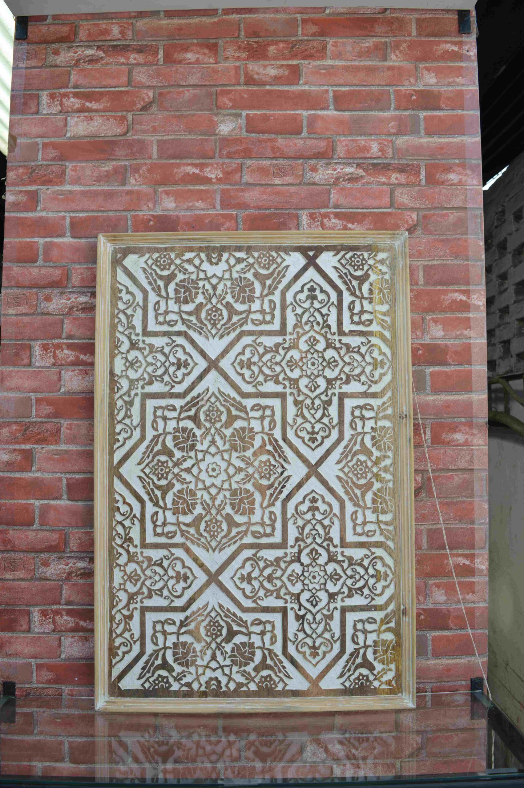 Handcrafted Wooden Wall Panel with Intricate Geometric Pattern