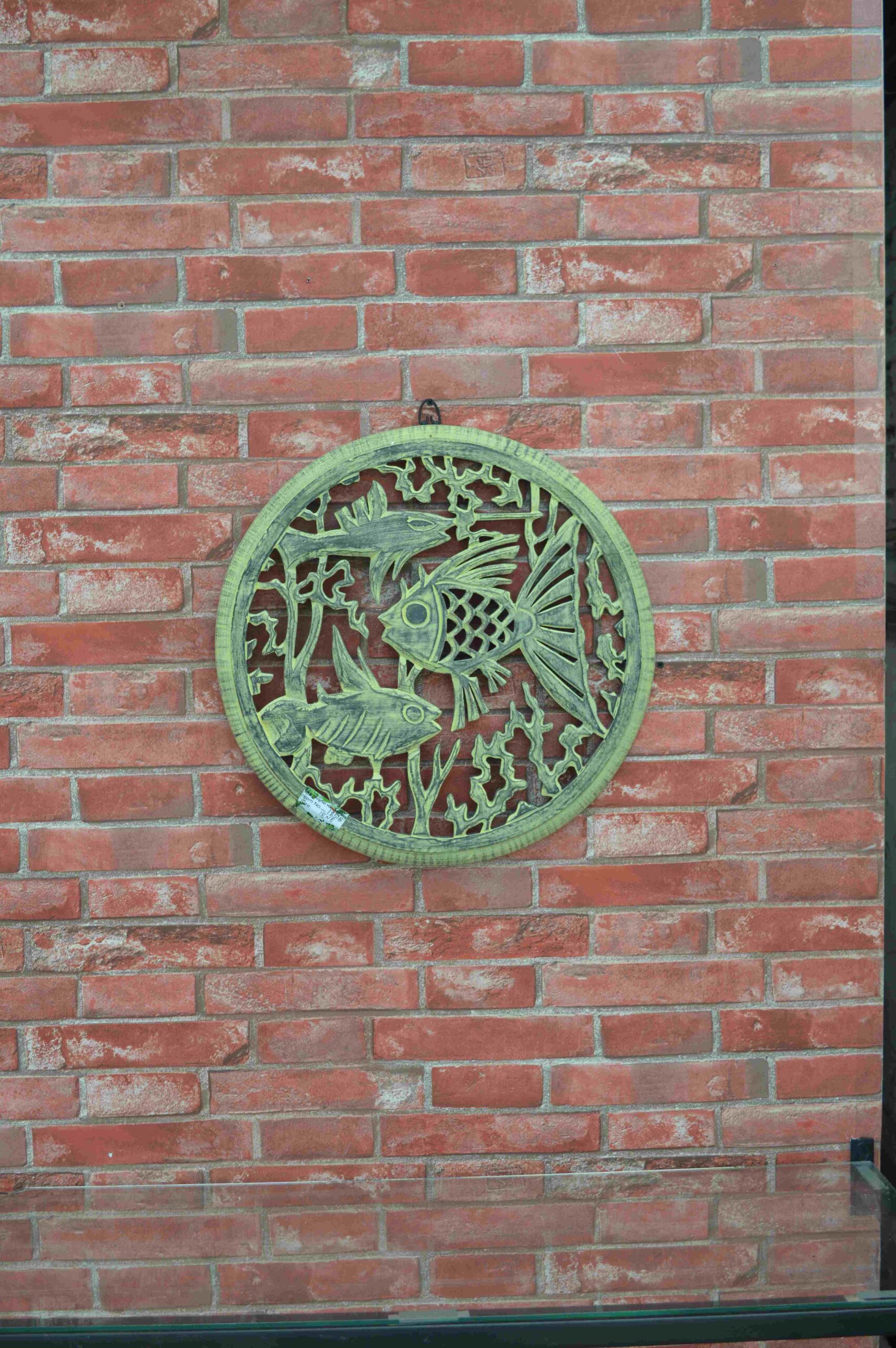 Round Wooden Wall Panel With Hand Carved Fish Design
