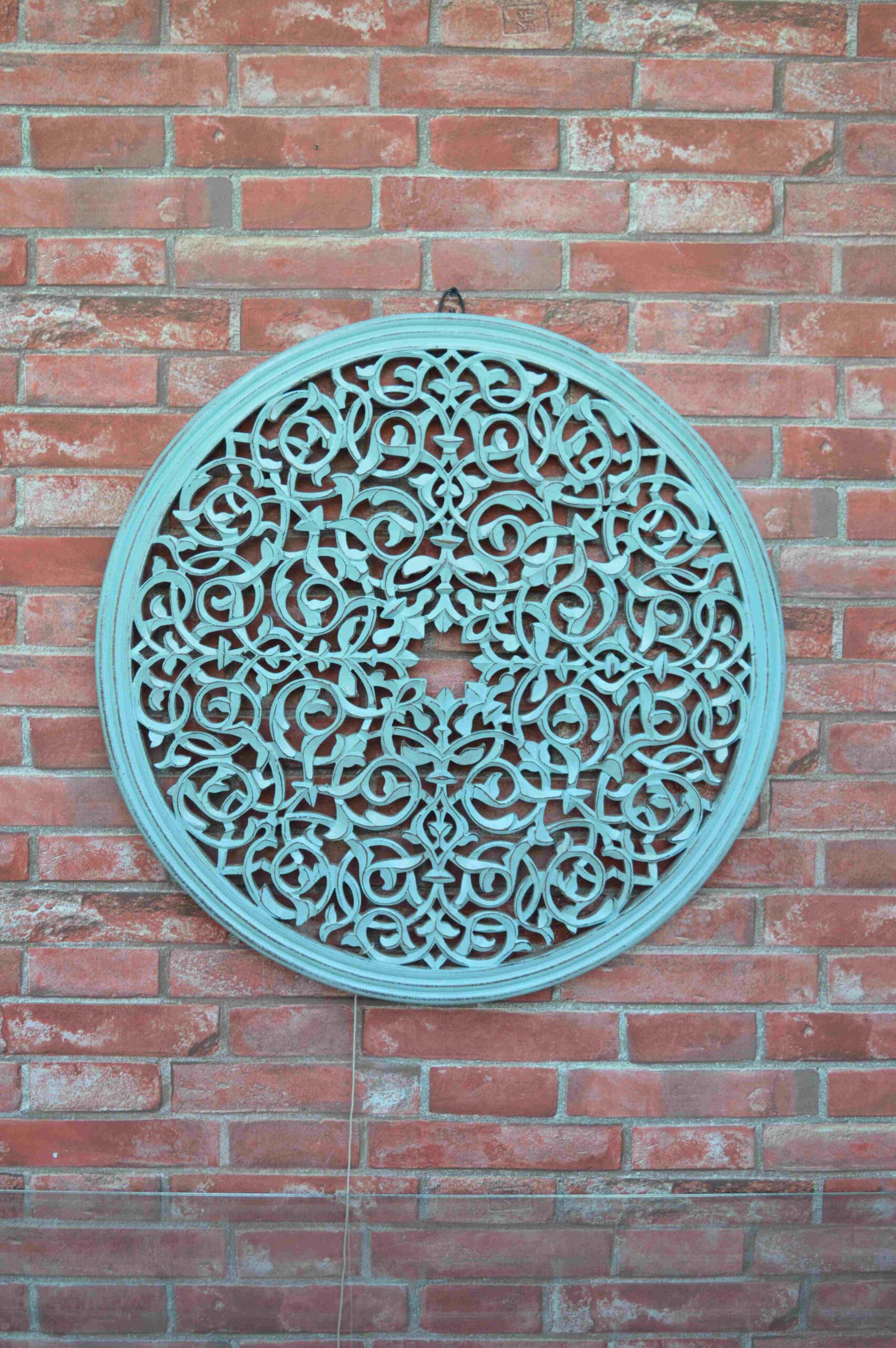 Handcrafted Round Wooden Wall Panel With Intricate Lattice Design